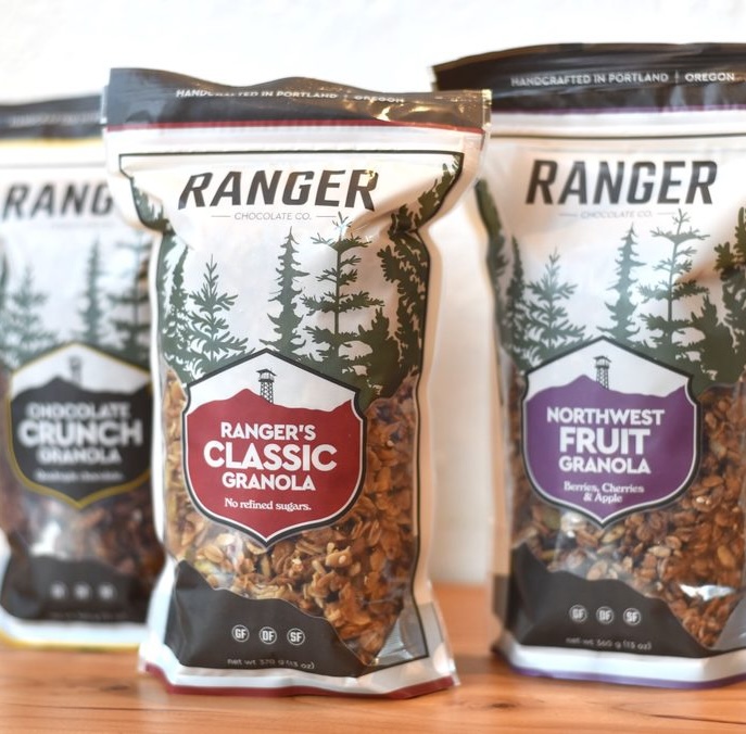 Three bags of Ranger Chocolate Co. granola: Chocolate Crunch, Ranger's Classic, and Northwest Fruit