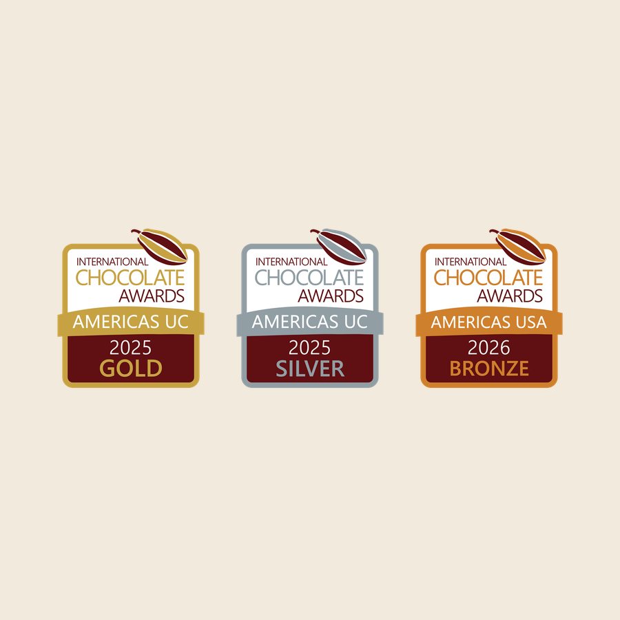 Three International Chocolate Awards medals: gold, silver, and bronze