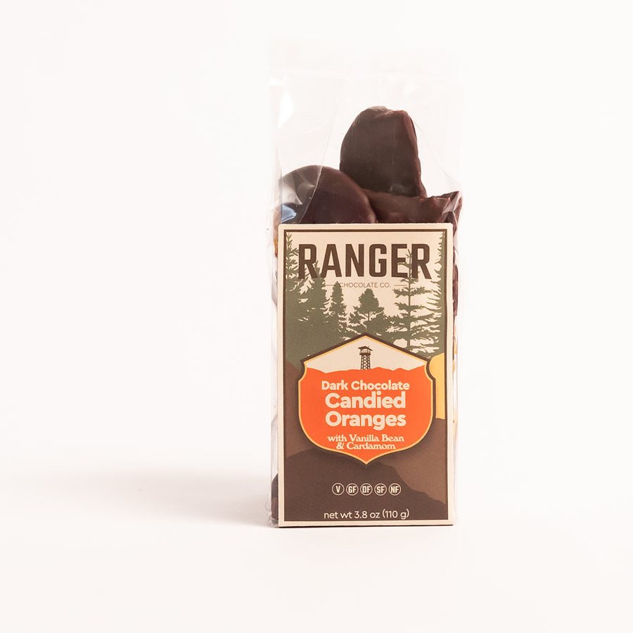 A bag of Ranger Dark Chocolate Candied Oranges with an orange badge