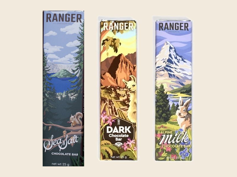 Three Ranger Explorer Series bars: Sea Salt, Dark, and Alpine Milk